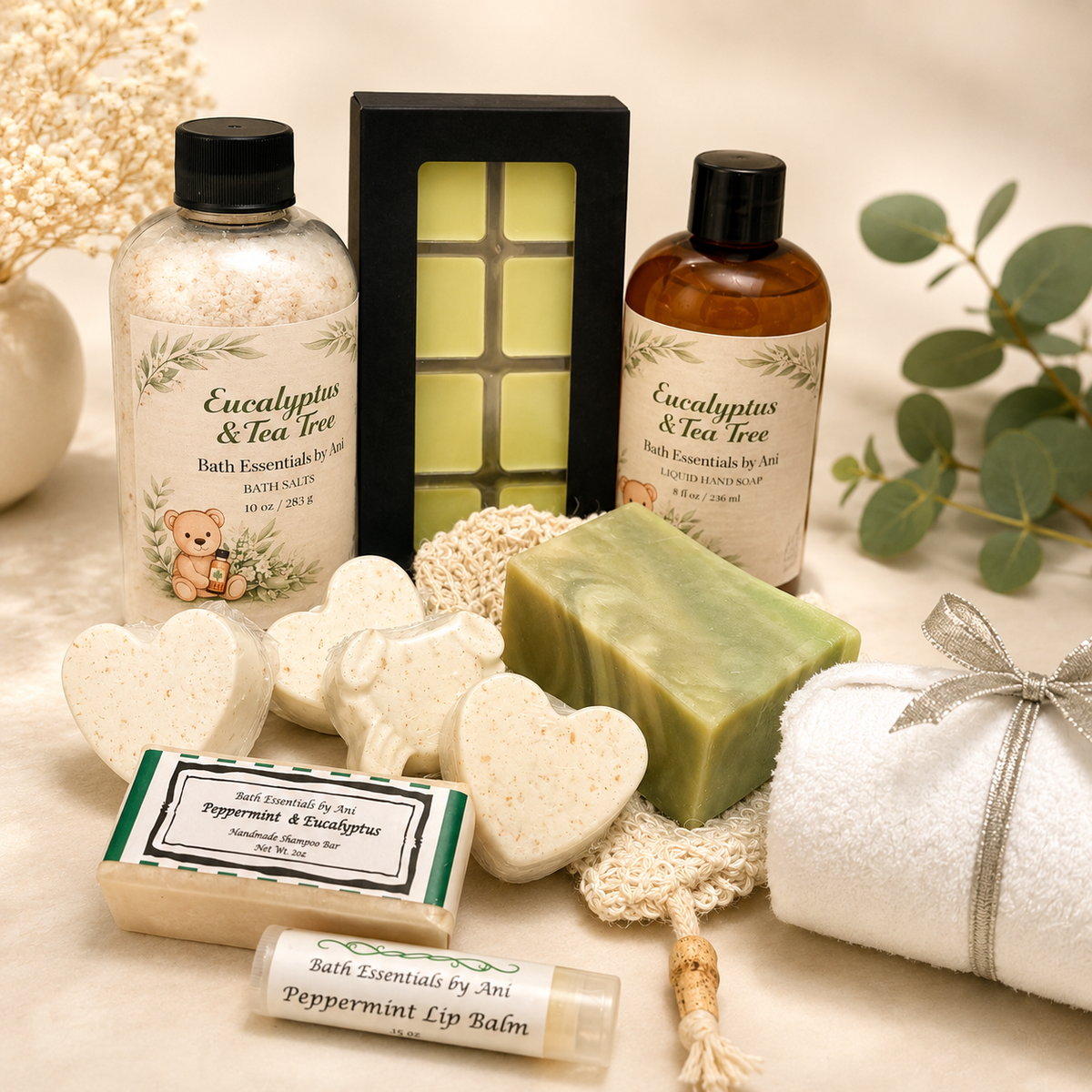 Bath gift set with eucalyptus & tea tree bottle, soap bar, heart soaps, and bath salts