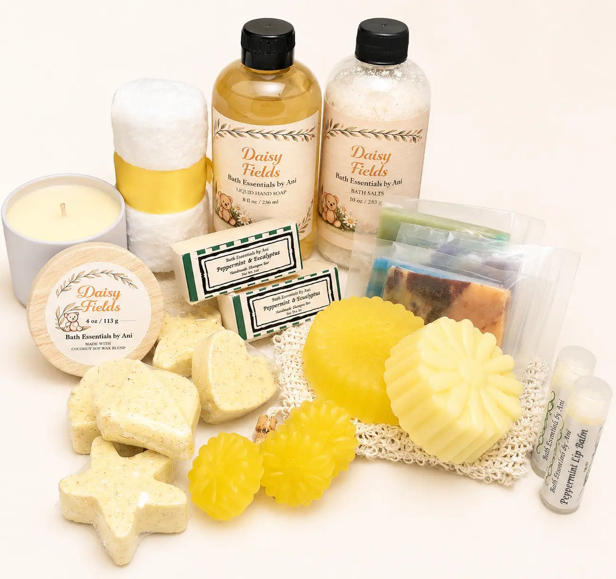 Yellow daisy bath gift set with soaps, bath salts, and towel pouch in a box
