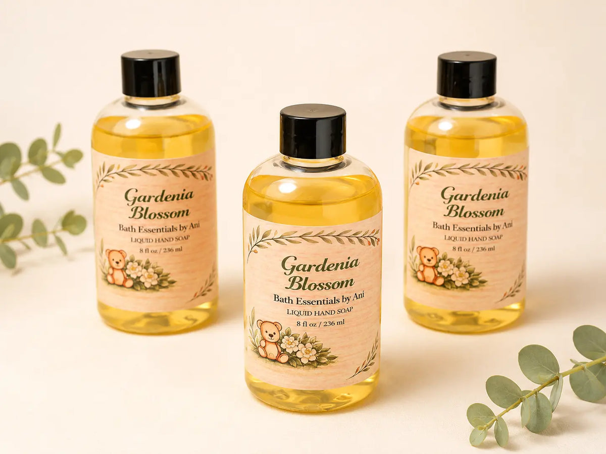 Gardenia blossom bath essentials set with three bottles in amber and clear with black caps