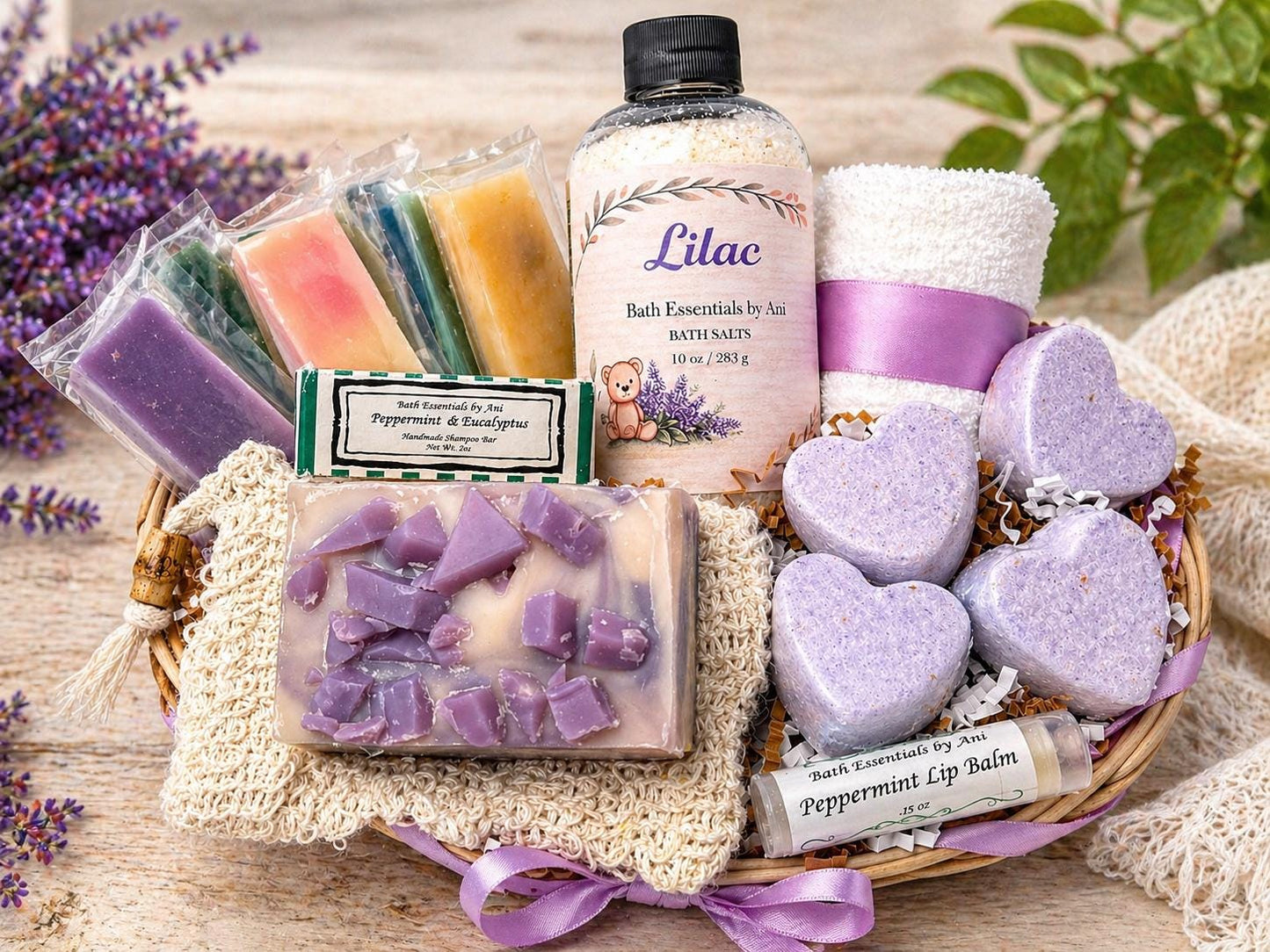 Lilac spa gift basket with purple soaps, bath hearts, bath salts, and a scented bottle.