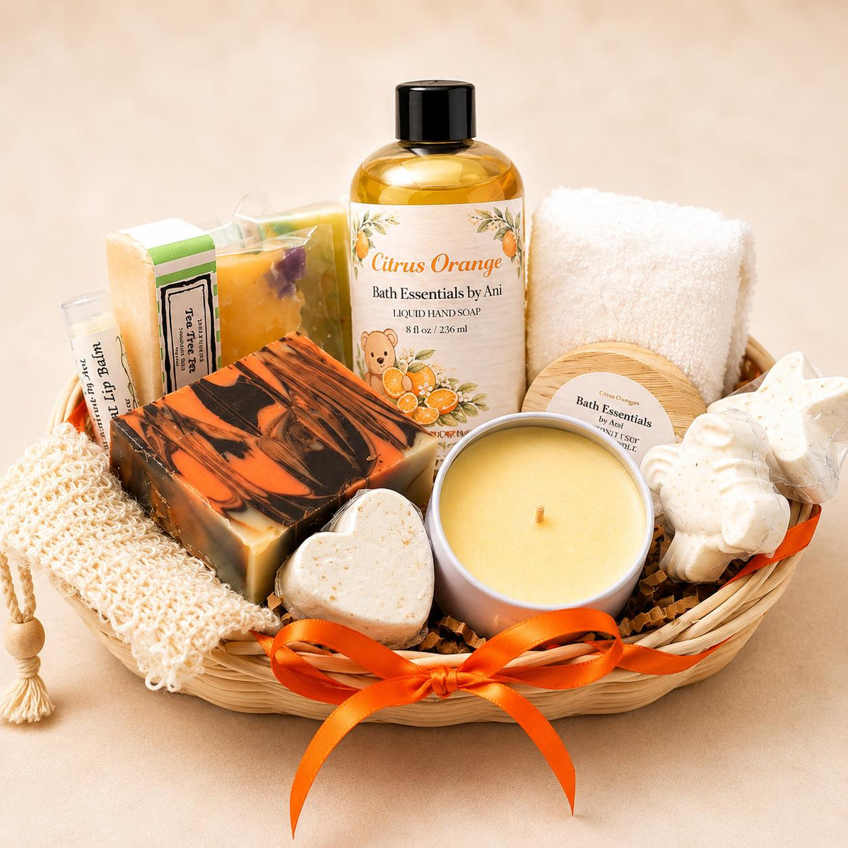 Spa gift basket with citrus bottle, candle, bar soaps, bath towel, and decorative ribbon