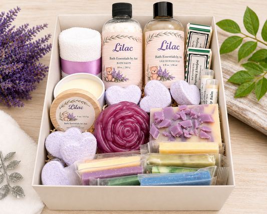 Bath gift box with lilac scented soaps, bath salts, candles, and lip balm bars