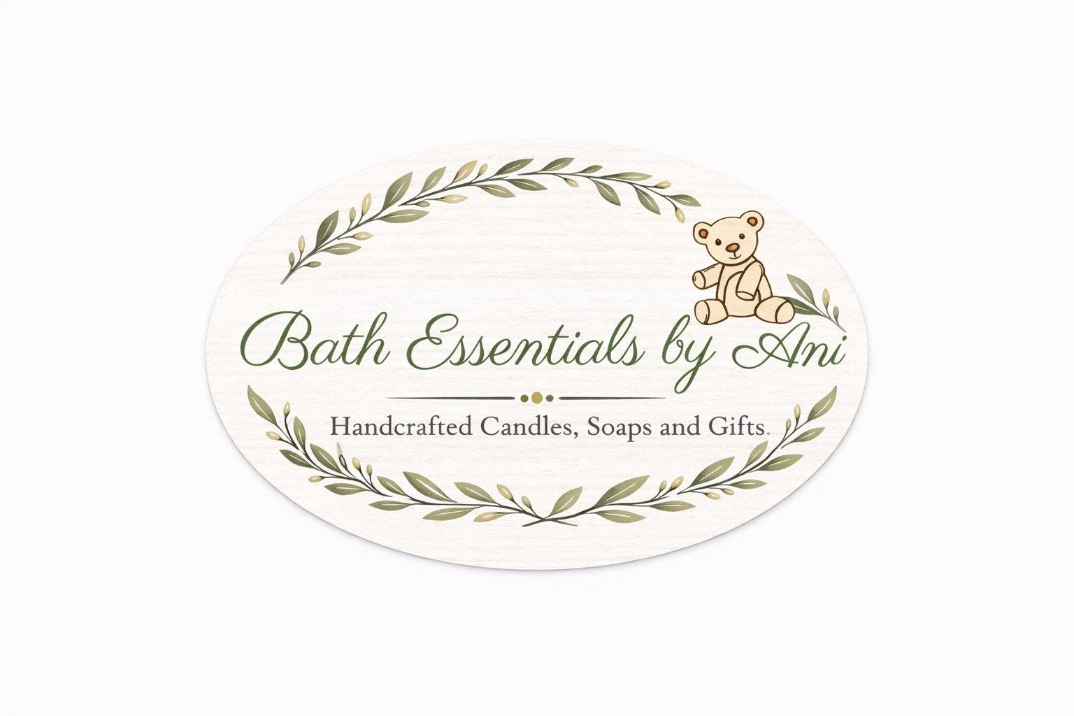 Round bath essentials label with laurel leaves and a bear icon, text centered on white