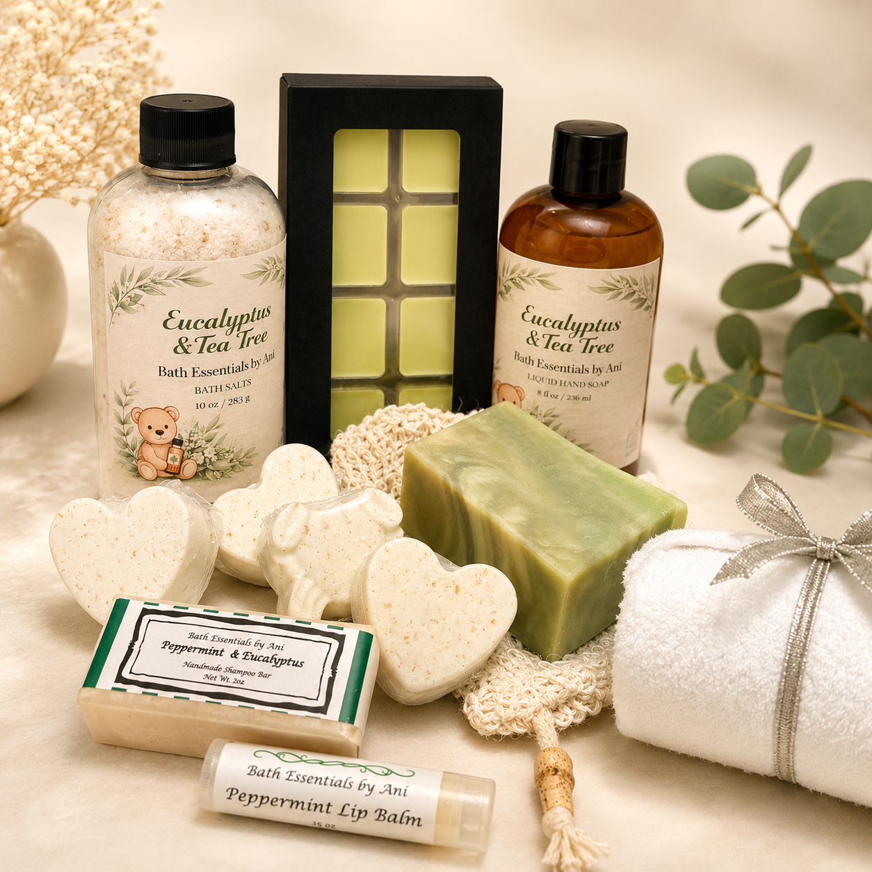 Bath gift set with eucalyptus & tea tree bottle, soap bar, heart soaps, and bath salts
