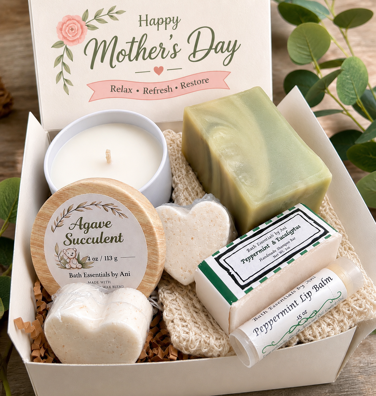 Mother's Day self-care gift box with candle, green soap bar, bath essentials tin, and lip balm