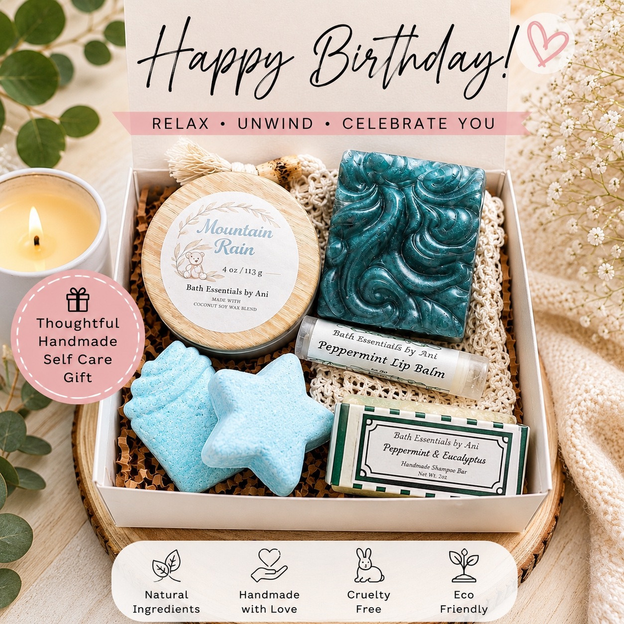 Birthday spa gift box with teal soap bar, blue bath bombs, candle, and lip balm