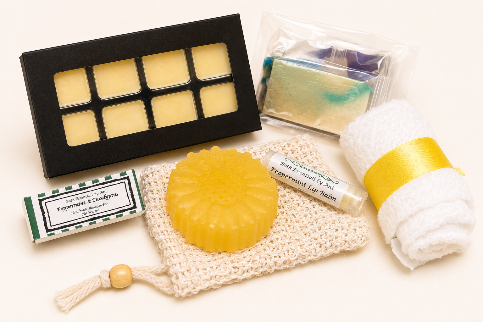 Bath essentials bundle with wax melts, soap bars, flower soap, and washcloth