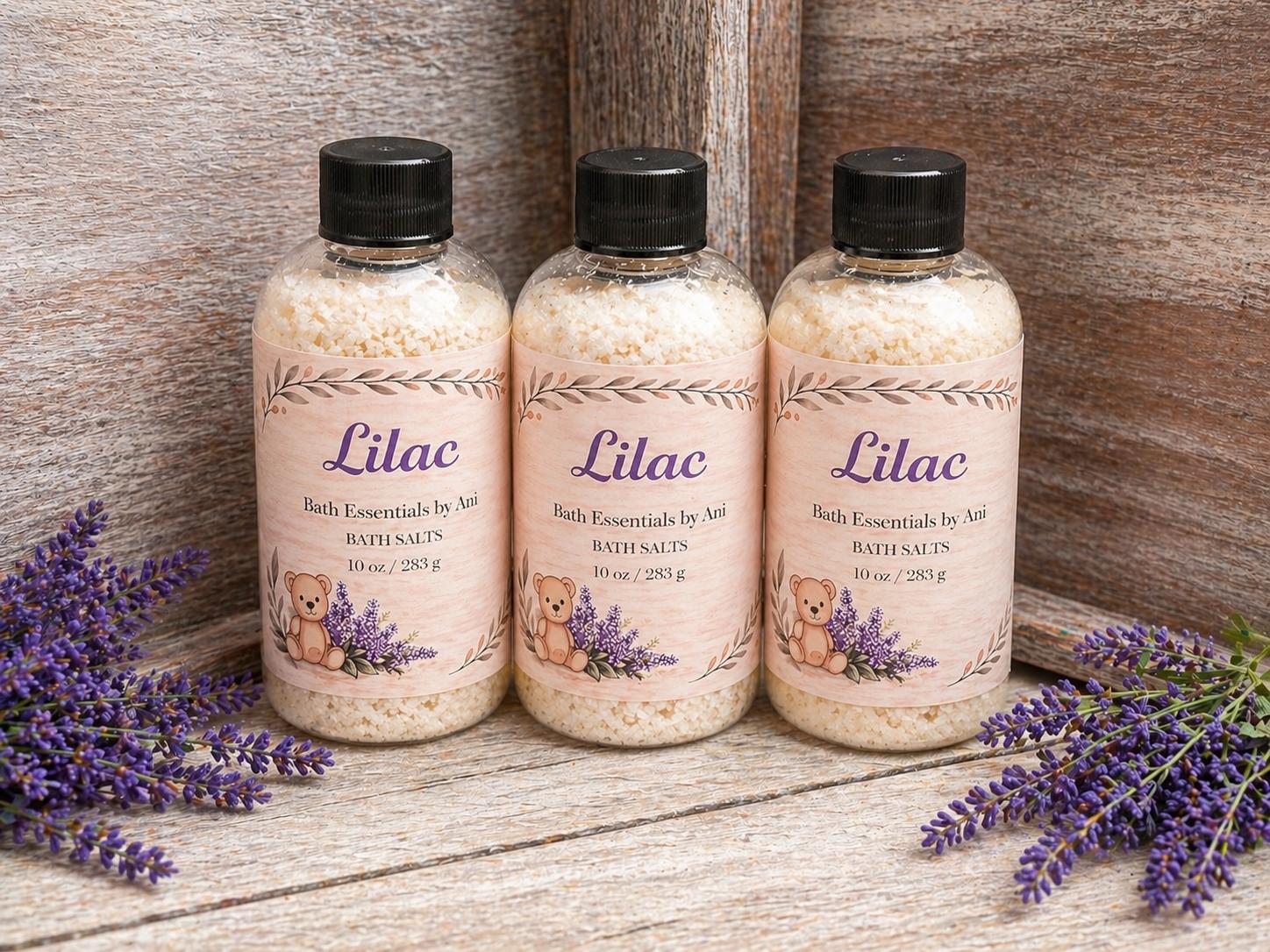 Three Lilac bath salts bottles with lavender flowers on labels