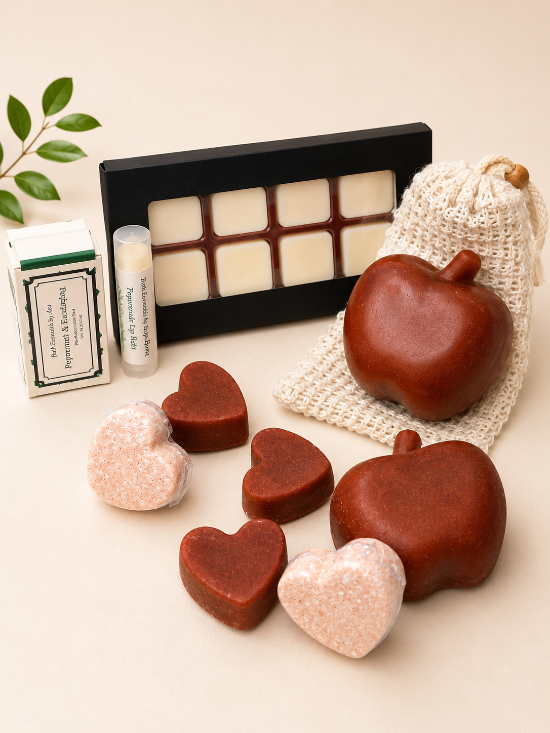 Bath gift set with bar soaps and heart-shaped bath bombs on tray