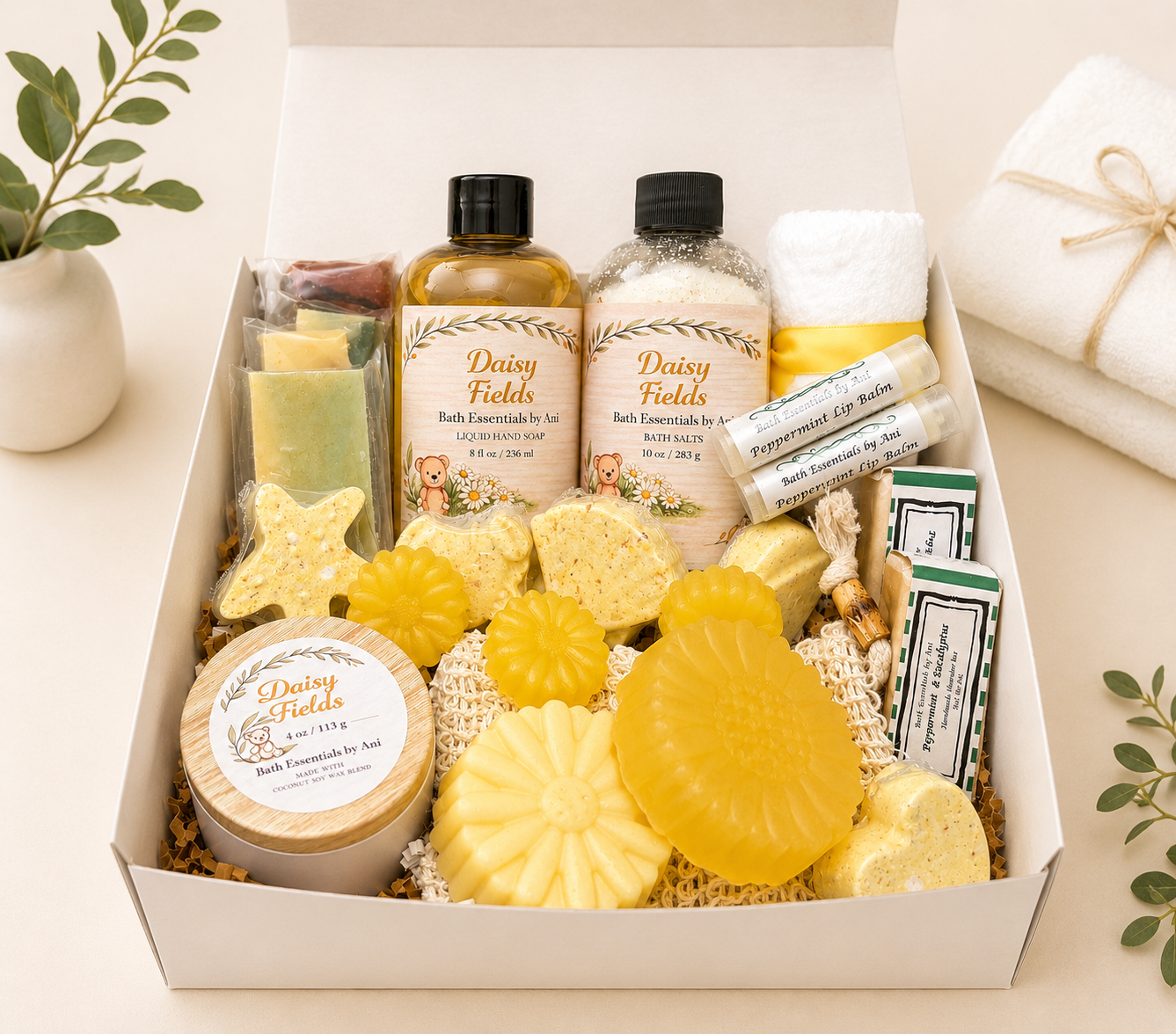 Yellow daisy bath gift box with handmade soaps, bath salts, and bath accessories inside