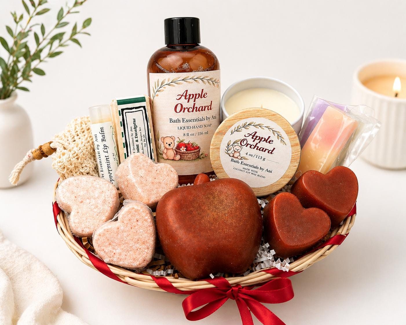 Bath essentials gift basket with apple-scented soaps, bath salts, and lip balm