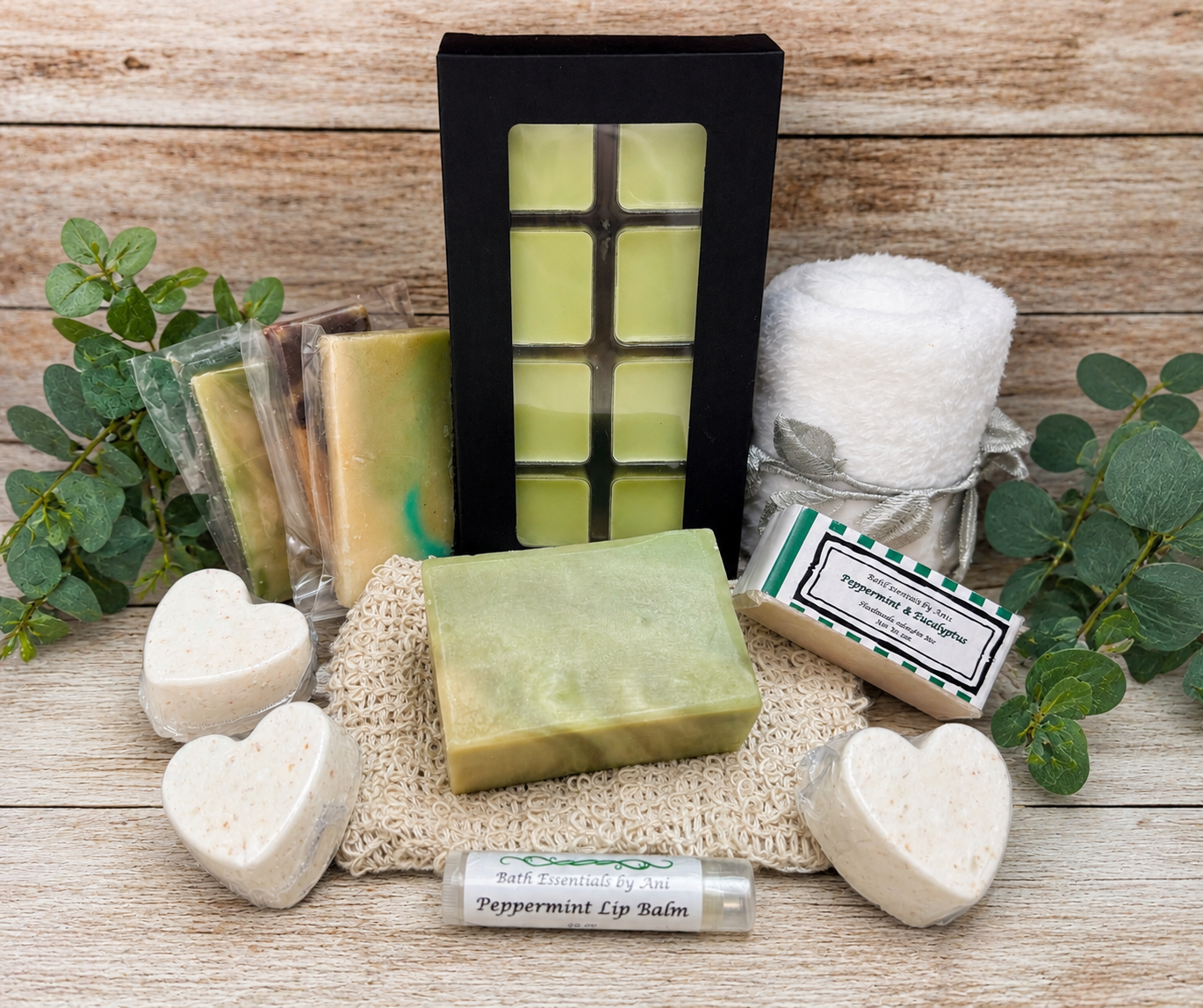Spa gift set with green wax melt bar, heart soap, and wrapped lip balm in box