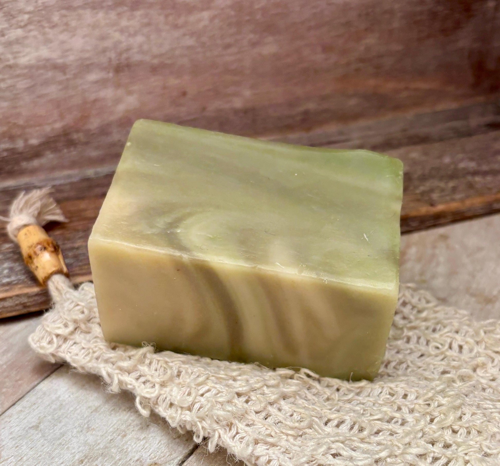Rectangular bar soap, light green with subtle marbled swirls