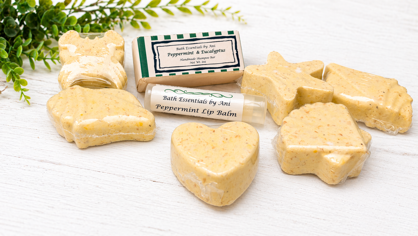 Set of bath soaps and bar labels with peppermint lip balm at center