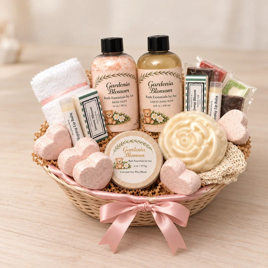 Spa gift basket in wicker tray with gardenia bottles, bath bars, and rose candle