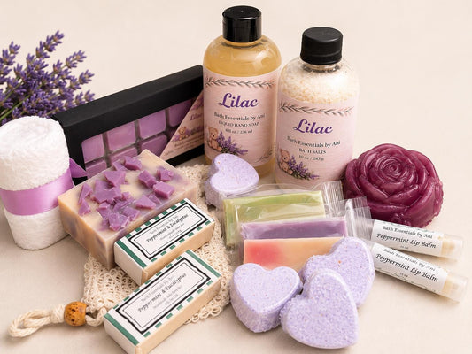 Lilac spa bath pamper box with bottles, purple soap cubes, heart bath bombs, and bars