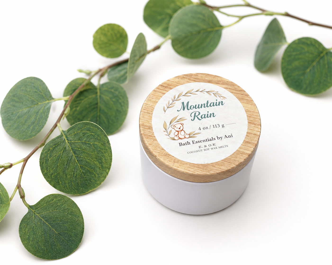Round bath butter jar with Mountain Rain label and green leaves
