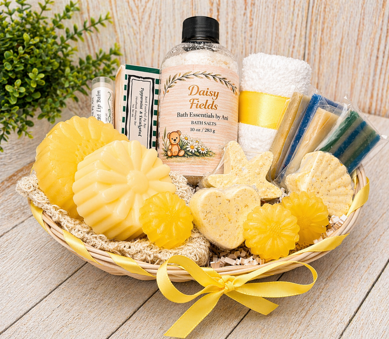 Yellow daisy bath gift basket with bar soaps, bath salts jar, and loofah cloth