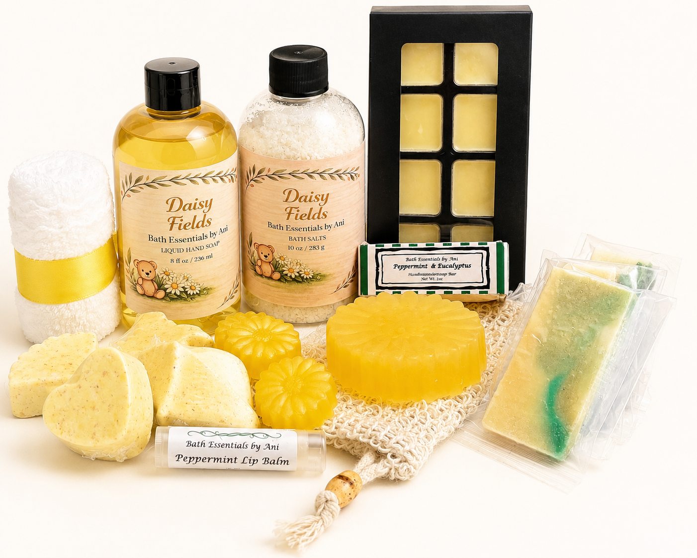 Yellow daisy bath gift set with yellow soaps, bath salts, lip balm, and candle in box