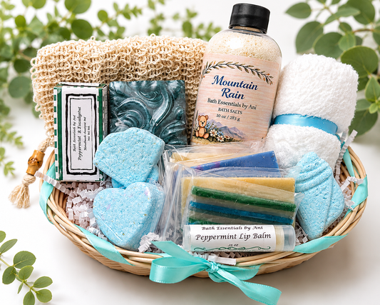 Spa gift basket with blue bath soaps, bath salts bottle, and wrapped soap bars