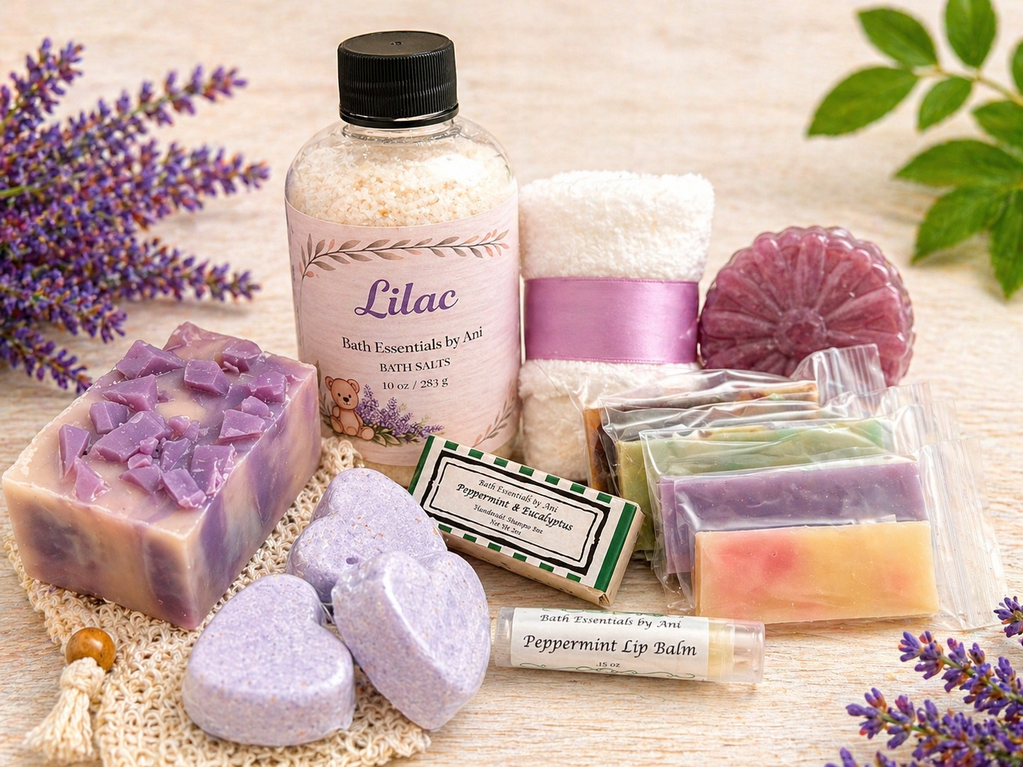 Spa gift basket with purple bath essentials: soap bar, bath salts bottle, bath bombs, lip balm.