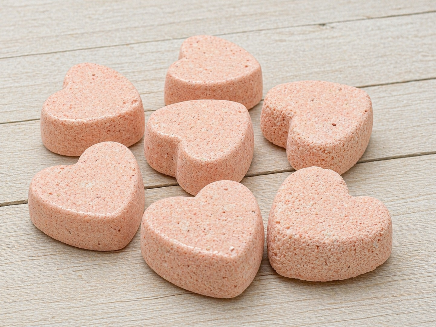 Heart-shaped bath bombs, pink textured bath bombs