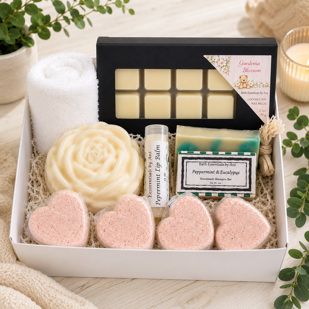 Bath gift set in box with wax melt tray, towel roll, swirl soap and heart bath bombs