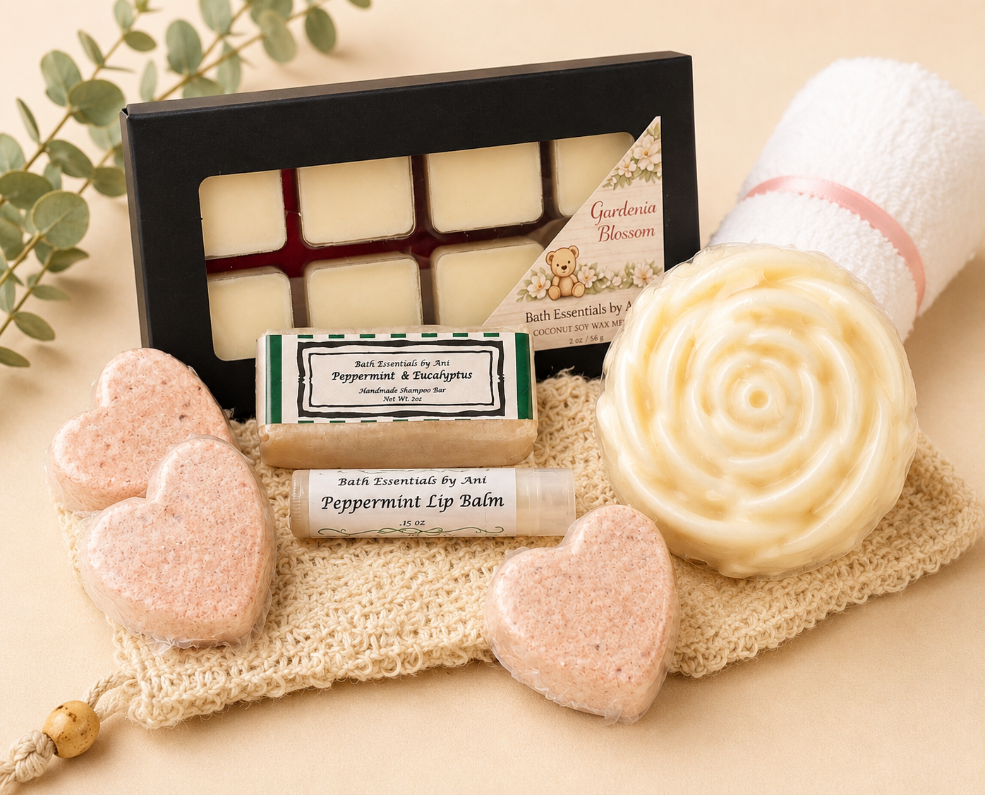 Spa bath gift set with pink heart bath bombs, swirl soap, towel roll and wax melt tray