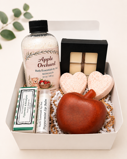 Bath gift box with heart soaps, pink bath bombs, salts and bottle