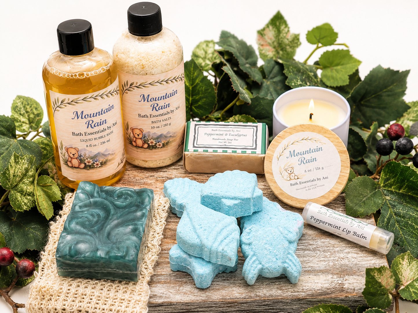Spa gift set on tray with blue bath bars, bath bombs, soaps, candle and lip balm