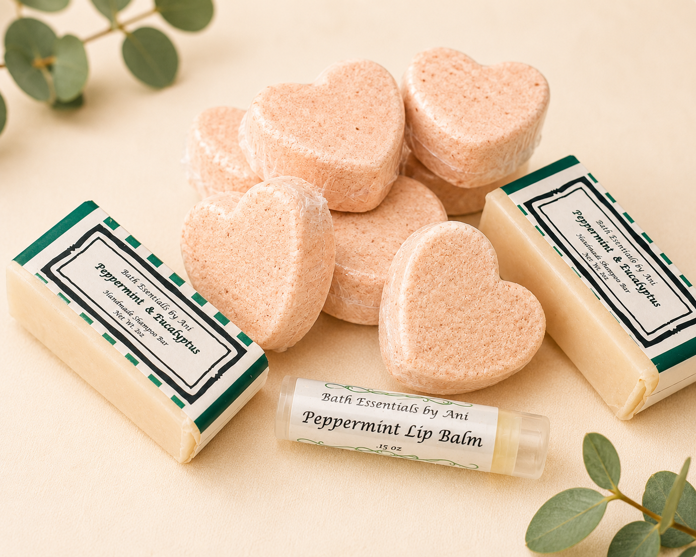 Heart-shaped pink soap bars with matching balm tube and small boxed soap bars.