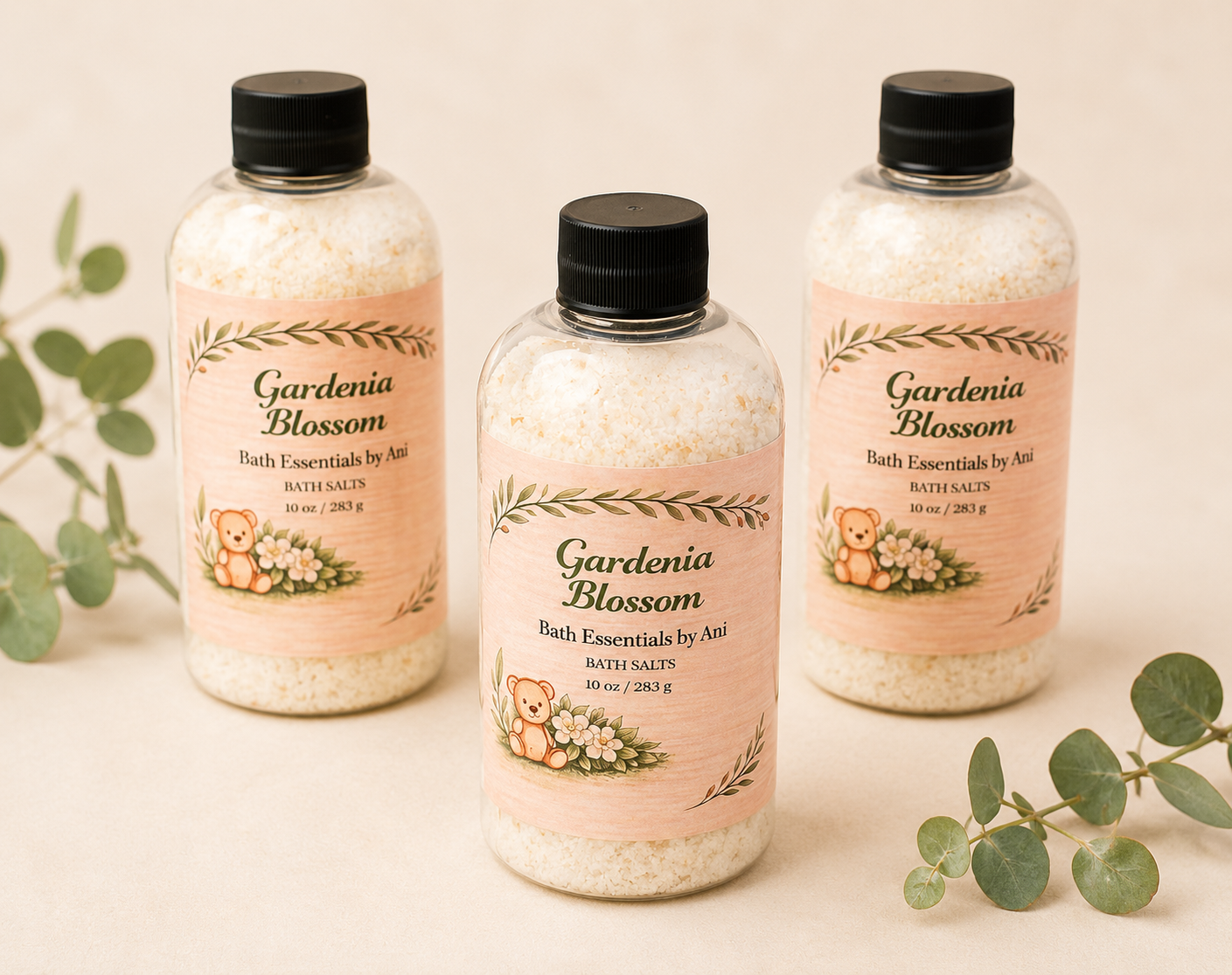 Gardenia blossom bath essentials bottles, white plastic with black caps, three-pack