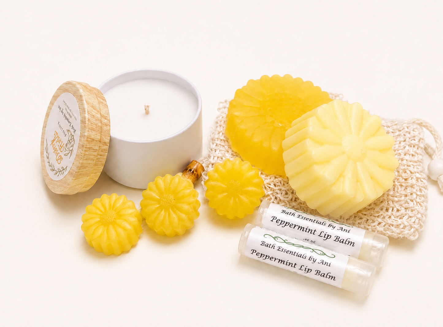 Yellow daisy bath gift set with candle, yellow soaps, and peppermint lip balm in box