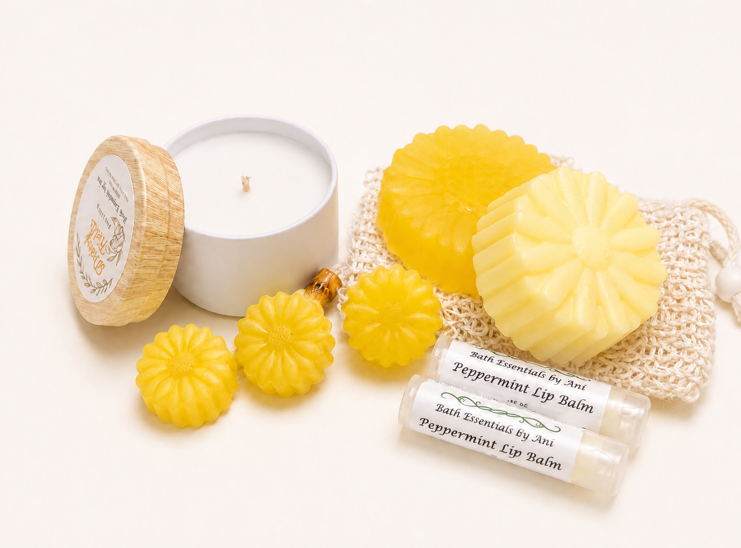 Yellow daisy bath gift set with candle, yellow soaps, and peppermint lip balm in box