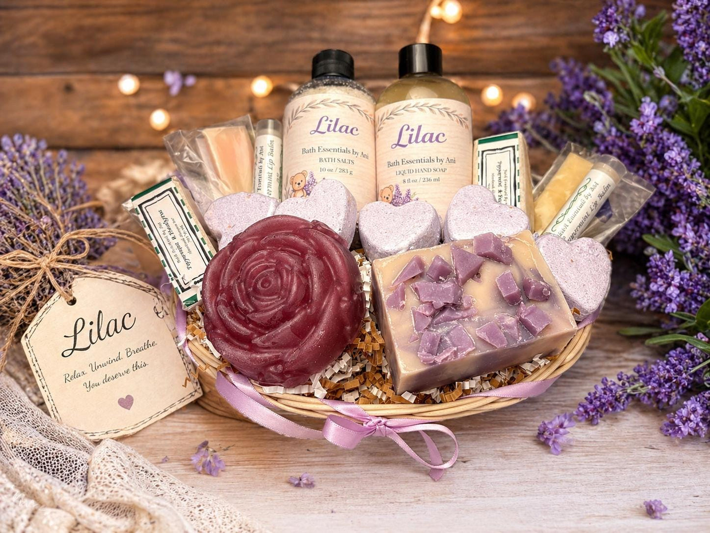 Lilac bath gift basket in a round basket with rose soap and lavender heart bath bombs