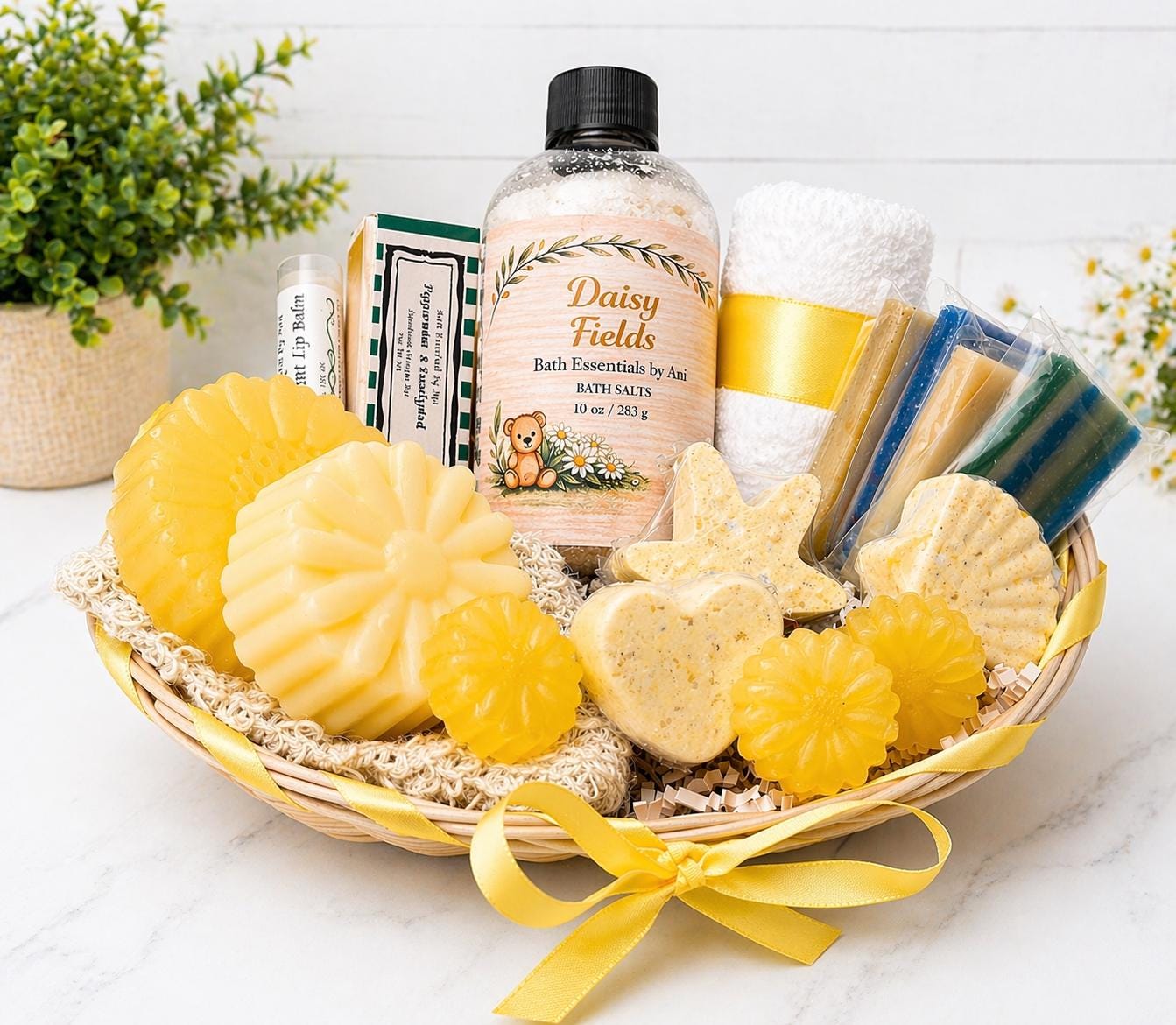 Yellow daisy gift basket with handmade yellow flower soaps, bath salts bottle, and bar soaps