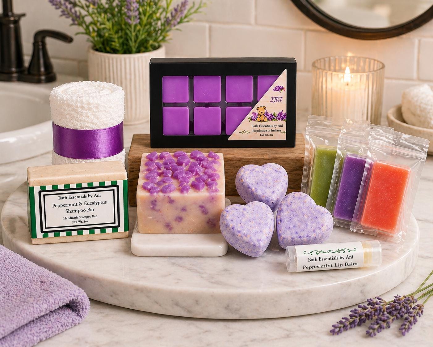 Spa gift set tray with purple wax melts, soap bars, heart soaps, and lip balm