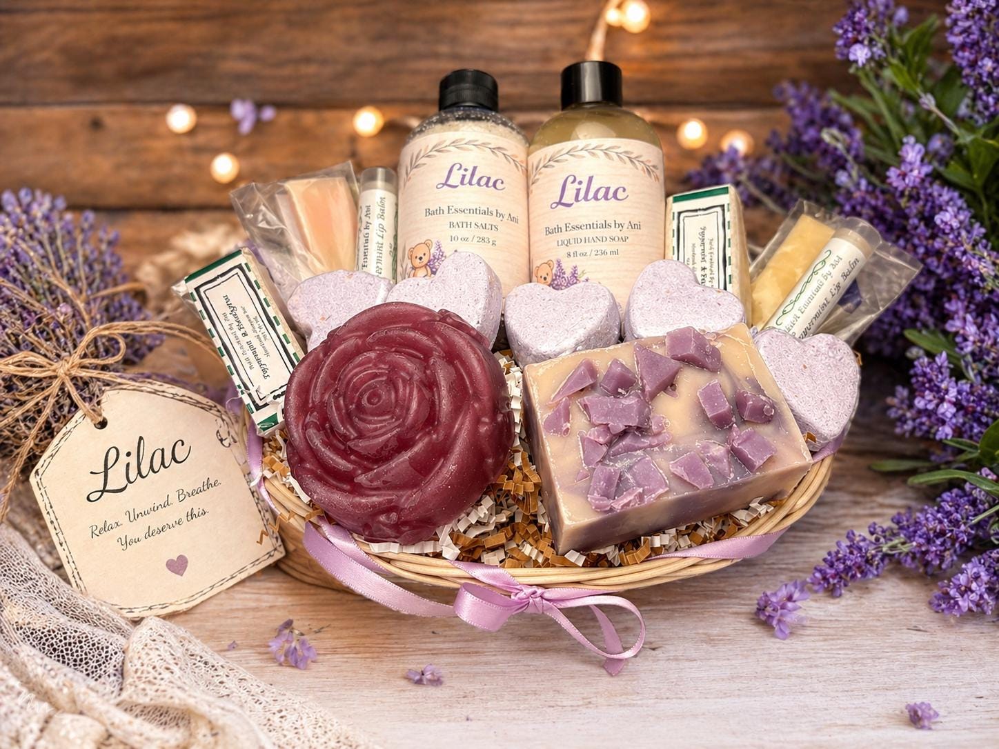 Lilac bath self-care set in a basket with soap rose, lavender hearts, and bath bar pieces