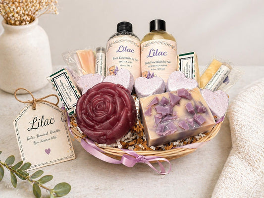 Lilac bath gift basket with handmade soaps, bath salts, lip balm, and heart bath bombs