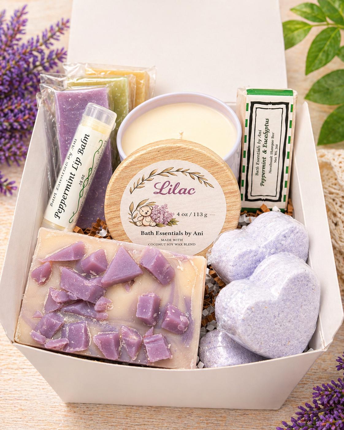 Bath gift box with lilac tin, candle, soap bars, heart bath melts, and lip balm