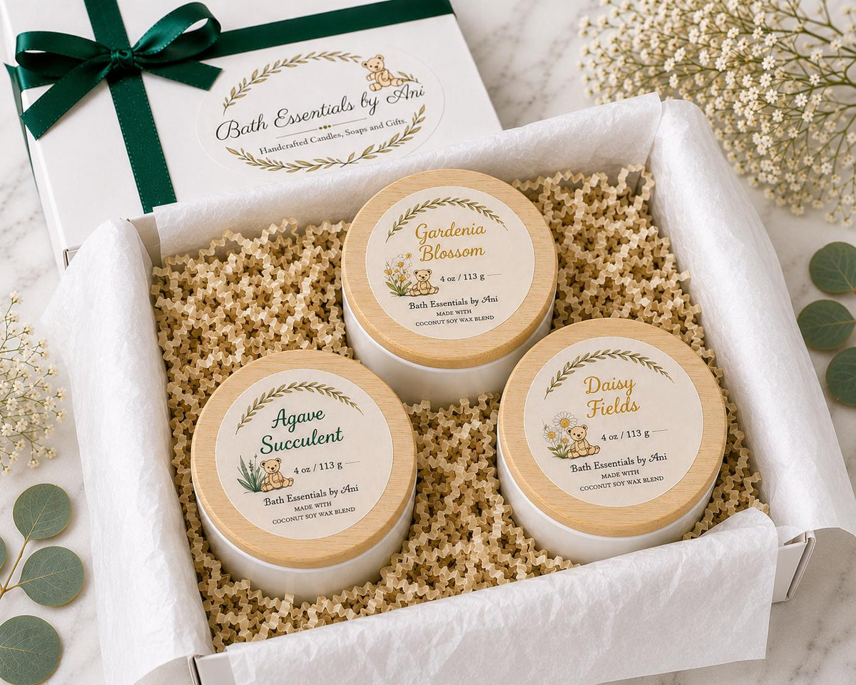 Coconut soy candle gift set with three round tins labeled Agave, Gardenia, Daisy Fields