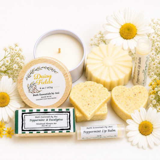 Self care gift set with round candle, soap bars, and lip balm pieces on a tray
