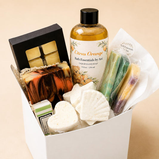 Spa gift box with Citrus Orange bath essentials, soap bars, bath bombs, and lip balm